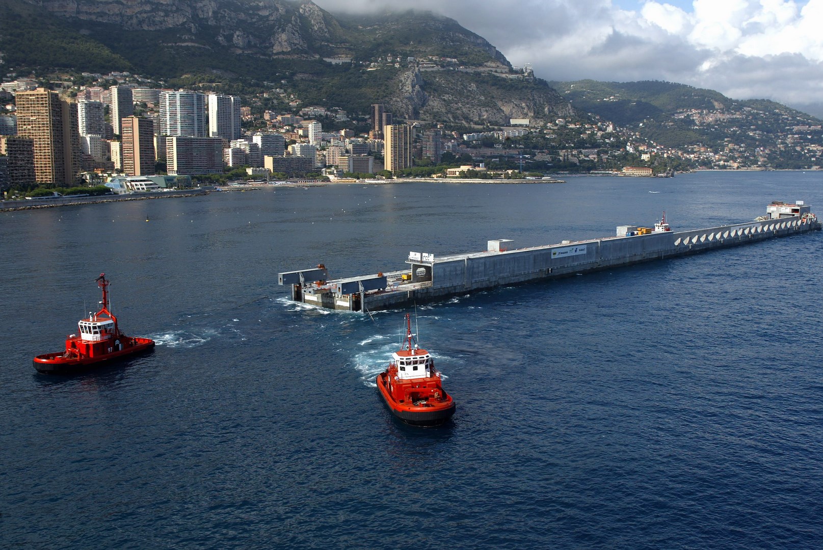 The floating dock being towed towards the Port of Monaco