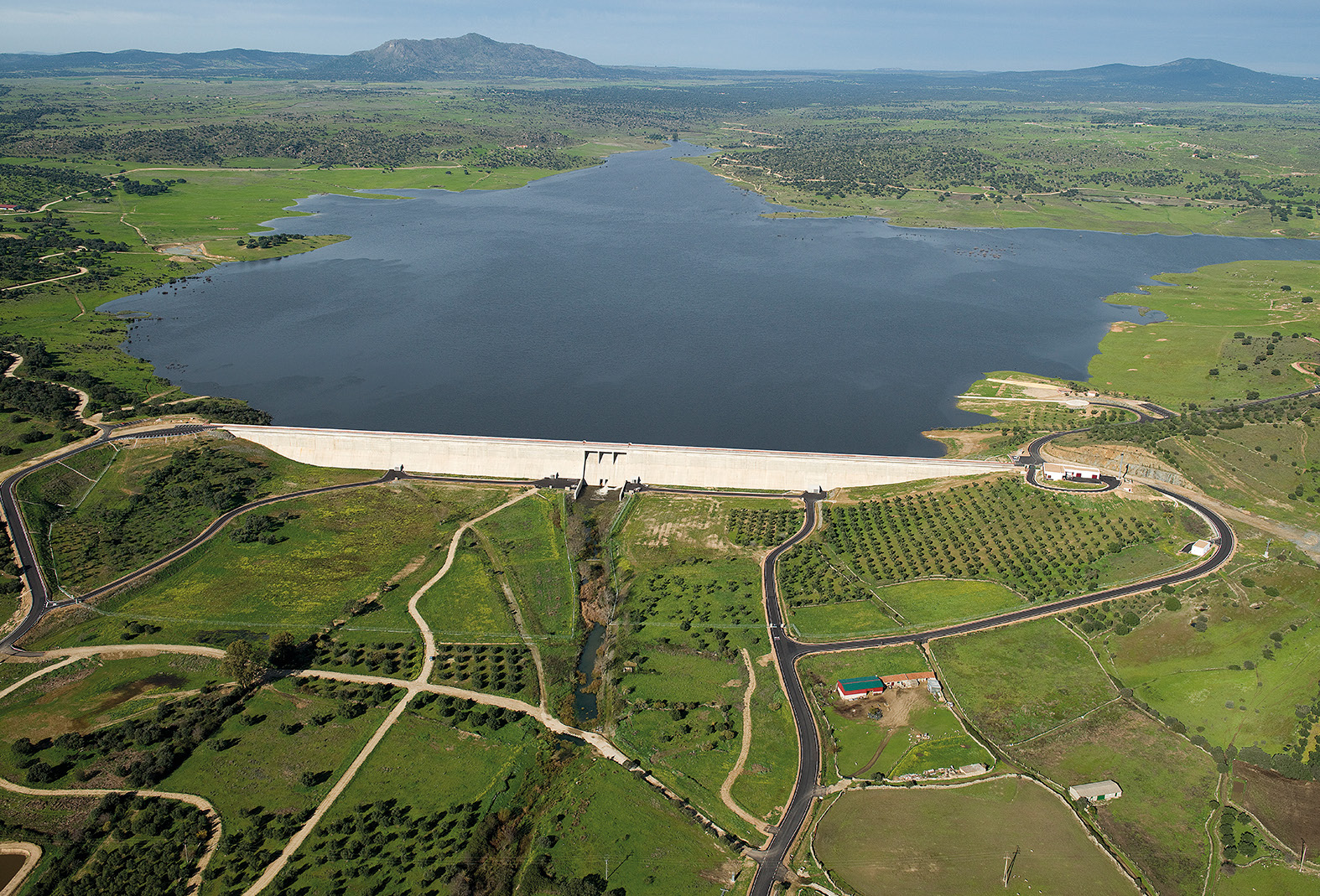 Alcollarín Dam aerial view